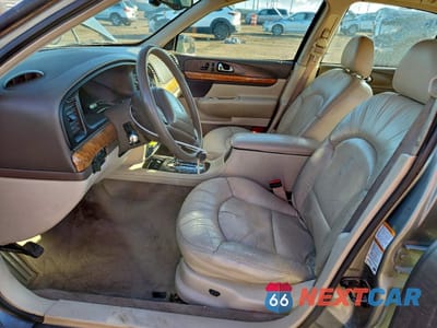 Zdjęcie 7 z 14 samochodu: 2000 LINCOLN CONTINENTAL VIN:1LNHM97V8YY892407 - miniatura