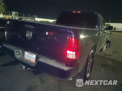Trzecie zdjęcie samochodu z tyłu: 2018 RAM 1500 ST VIN:1C6RR6FG4JS330709 - miniatura