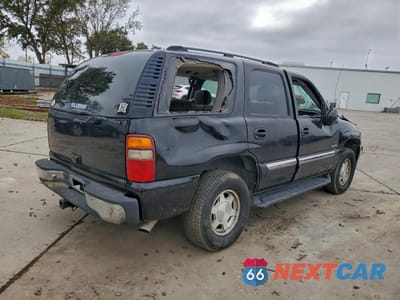 Trzecie zdjęcie samochodu z tyłu: 2003 GMC YUKON VIN:1GKEC13V73R186098 - miniatura