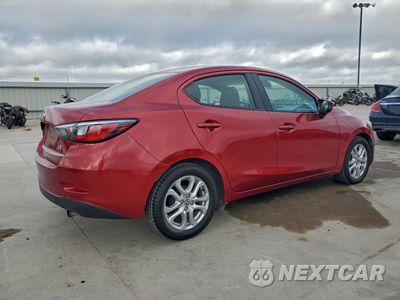 Trzecie zdjęcie samochodu z tyłu: 2016 TOYOTA SCION IA VIN:3MYDLBZV1GY129739 - miniatura