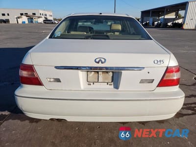Zdjęcie 6 z 11 samochodu: 1999 INFINITI Q45 BASE VIN:JNKBY31A1XM601851 - miniatura