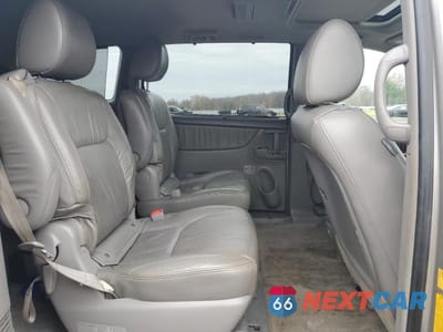 Zdjęcie 11 z 13 samochodu: 2010 TOYOTA SIENNA XLE VIN:5TDYK4CC3AS316002 - miniatura