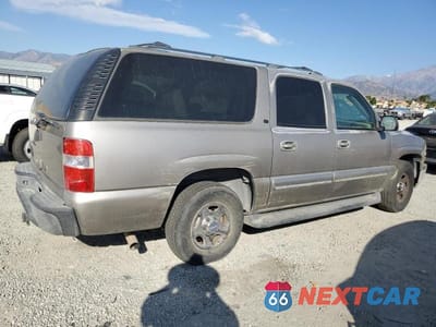 Trzecie zdjęcie samochodu z tyłu: 2002 CHEVROLET SUBURBAN C1500 VIN:1GNEC16T42J216099 - miniatura