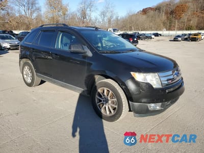 Czwarte zdjęcie samochodu z boku: 2010 FORD EDGE SEL VIN:2FMDK3JC9ABB56636 - miniatura