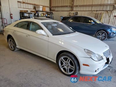 Czwarte zdjęcie samochodu z boku: 2006 MERCEDES-BENZ CLS 500C VIN:WDDDJ75X56A073810 - miniatura