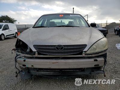Piąte zdjęcie samochodu w środku: 2002 TOYOTA CAMRY LE VIN:JTDBE32K020060969 - miniatura