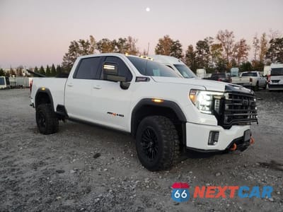 Czwarte zdjęcie samochodu z boku: 2021 GMC SIERRA K2500 AT4 VIN:1GT49PEY6MF254734 - miniatura