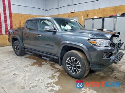 Czwarte zdjęcie samochodu z boku: 2022 TOYOTA TACOMA TRD SPORT VIN:3TMCZ5AN4NM532799 - miniatura
