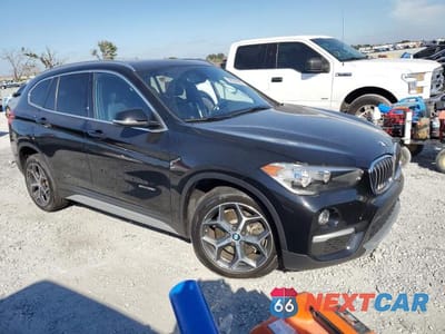 Czwarte zdjęcie samochodu z boku: 2018 BMW X1 SDRIVE28I VIN:WBXHU7C3XJ5H44771 - miniatura