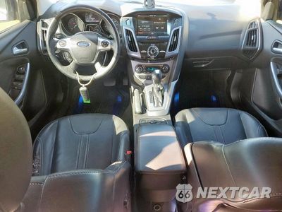 Zdjęcie 8 z 11 samochodu: 2014 FORD FOCUS TITANIUM VIN:1FADP3N28EL281436 - miniatura