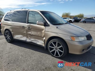 Czwarte zdjęcie samochodu z boku: 2000 HONDA ODYSSEY EX VIN:2HKRL1863YH585152 - miniatura