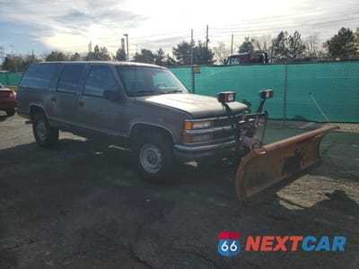 Czwarte zdjęcie samochodu z boku: 1994 CHEVROLET SUBURBAN K1500 VIN:1GNFK16K7RJ395442 - miniatura