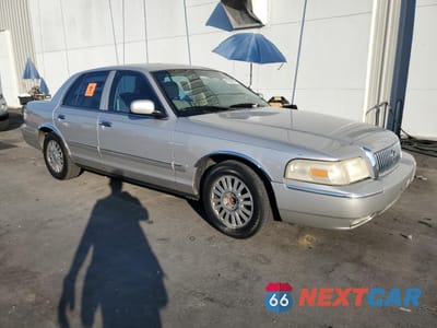 Czwarte zdjęcie samochodu z boku: 2007 MERCURY GRAND MARQUIS LS VIN:2MEFM75V87X628121 - miniatura