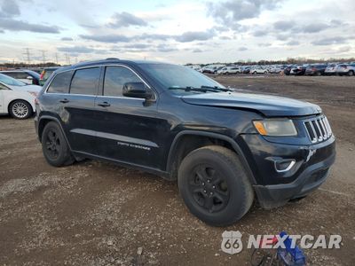 Czwarte zdjęcie samochodu z boku: 2014 JEEP GRAND CHEROKEE LAREDO VIN:1C4RJFAG3EC132601 - miniatura