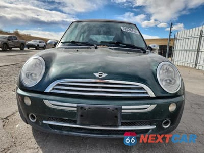 Piąte zdjęcie samochodu w środku: 2006 MINI COOPER VIN:WMWRC33536TK71128 - miniatura