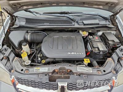 Zdjęcie 12 z 12 samochodu: 2014 DODGE GRAND CARAVAN SXT VIN:2C4RDGCG5ER253647 - miniatura