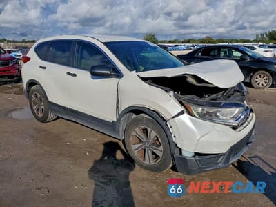 Czwarte zdjęcie samochodu z boku: 2017 HONDA CR-V LX VIN:5J6RW5H31HL005083 - miniatura
