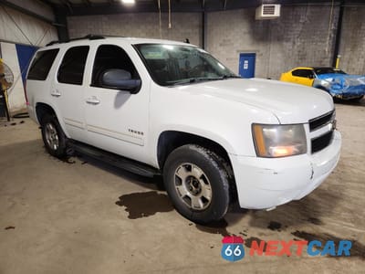 Czwarte zdjęcie samochodu z boku: 2010 CHEVROLET TAHOE K1500 LT VIN:1GNUKBE06AR232204 - miniatura