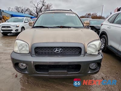 Piąte zdjęcie samochodu w środku: 2004 HYUNDAI SANTA FE VIN:KM8SC13D84U570097 - miniatura