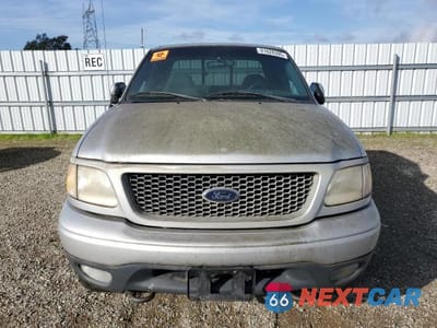 Piąte zdjęcie samochodu w środku: 2000 FORD F-150 VIN:1FTRX18L2YKA96009 - miniatura