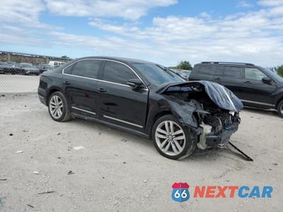 Czwarte zdjęcie samochodu z boku: 2017 VOLKSWAGEN PASSAT SE VIN:1VWGT7A32HC057881 - miniatura