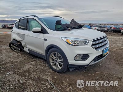 Czwarte zdjęcie samochodu z boku: 2017 FORD ESCAPE SE VIN:1FMCU9GD2HUA54883 - miniatura