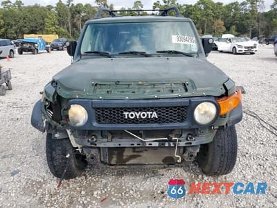 Piąte zdjęcie samochodu w środku: 2011 TOYOTA FJ CRUISER VIN:JTEBU4BF4BK112227 - miniatura