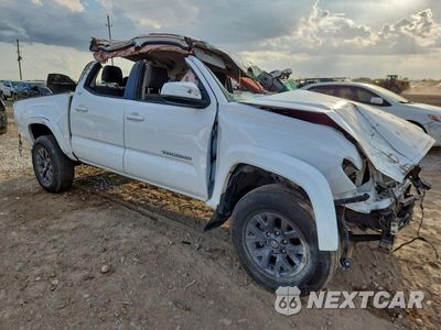 Czwarte zdjęcie samochodu z boku: 2023 TOYOTA TACOMA VIN:3TMAZ5CN4PM196305 - miniatura