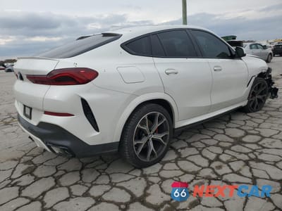 Trzecie zdjęcie samochodu z tyłu: 2020 BMW X6 XDRIVE40I VIN:5UXCY6C01L9C95048 - miniatura