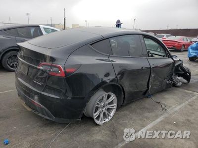 Trzecie zdjęcie samochodu z tyłu: 2024 TESLA Y VIN:7SAYGDEE5RF072890 - miniatura