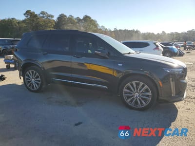 Czwarte zdjęcie samochodu z boku: 2020 CADILLAC XT6 SPORT VIN:1GYKPGRSXLZ125633 - miniatura