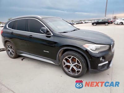 Czwarte zdjęcie samochodu z boku: 2018 BMW X1 SDRIVE28I VIN:WBXHU7C30J5H45489 - miniatura