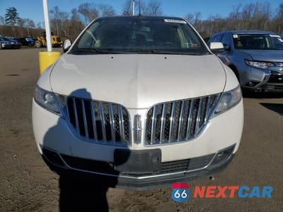Piąte zdjęcie samochodu w środku: 2013 LINCOLN MKX VIN:2LMDJ8JK2DBL24021 - miniatura