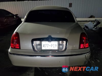 Zdjęcie 6 z 14 samochodu: 1999 LINCOLN TOWN CAR CARTIER VIN:1LNHM83W7XY691721 - miniatura