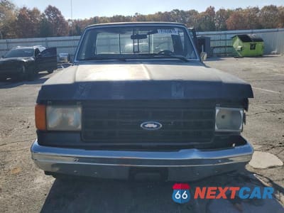 Piąte zdjęcie samochodu w środku: 1987 FORD F150 VIN:1FTDF15Y0HKB03827 - miniatura