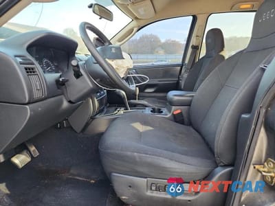 Zdjęcie 7 z 12 samochodu: 2004 JEEP GRAND CHEROKEE LAREDO VIN:1J4GX48S14C152746 - miniatura