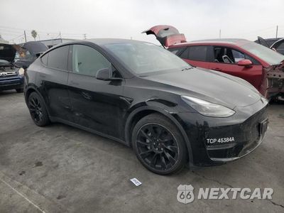 Czwarte zdjęcie samochodu z boku: 2024 TESLA Y VIN:7SAYGDEE6RA264512 - miniatura
