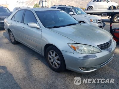 Czwarte zdjęcie samochodu z boku: 2003 TOYOTA CAMRY LE VIN:4T1BE30K13U751999 - miniatura
