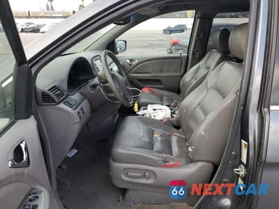 Zdjęcie 7 z 13 samochodu: 2010 HONDA ODYSSEY EXL VIN:5FNRL3H79AB094285 - miniatura