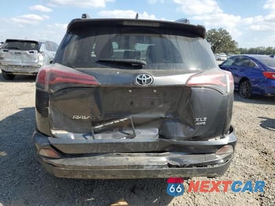 Zdjęcie 6 z 13 samochodu: 2017 TOYOTA RAV4 XLE VIN:JTMRFREV0HD217759 - miniatura
