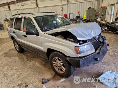 Czwarte zdjęcie samochodu z boku: 2003 JEEP GRAND CHEROKEE LAREDO VIN:1J4GW48S23C560531 - miniatura
