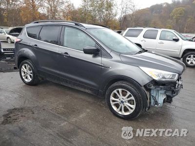 Czwarte zdjęcie samochodu z boku: 2018 FORD ESCAPE SEL VIN:1FMCU9HD5JUC21063 - miniatura
