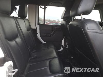 Zdjęcie 10 z 11 samochodu: 2014 JEEP WRANGLER UNLIMITED SAHARA VIN:1C4BJWEG6EL322971 - miniatura