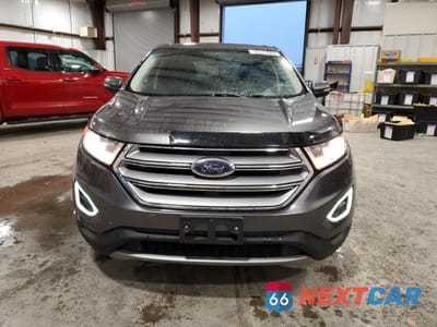 Piąte zdjęcie samochodu w środku: 2017 FORD EDGE TITANIUM VIN:2FMPK4K90HBB90707 - miniatura