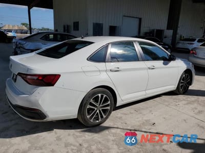 Trzecie zdjęcie samochodu z tyłu: 2023 VOLKSWAGEN JETTA SPORT VIN:3VWAM7BU2PM017582 - miniatura