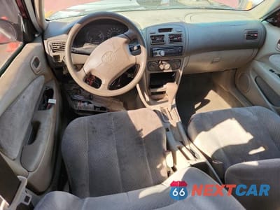 Zdjęcie 8 z 12 samochodu: 1999 TOYOTA COROLLA VE VIN:1NXBR12E1XZ215334 - miniatura
