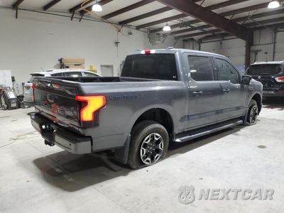 Trzecie zdjęcie samochodu z tyłu: 2023 FORD F150 LIGHTNING PRO VIN:1FTVW1ELXPWG05356 - miniatura