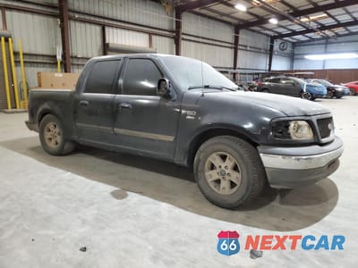 Czwarte zdjęcie samochodu z boku: 2001 FORD F150 SUPERCREW VIN:1FTRW07L11KC61147 - miniatura