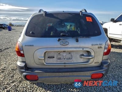 Zdjęcie 6 z 14 samochodu: 2003 HYUNDAI SANTA FE GLS VIN:KM8SC73E23U464917 - miniatura