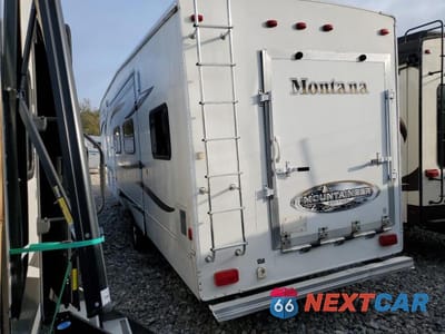 Trzecie zdjęcie samochodu z tyłu: 2010 KEYSTONE MONTANA CAMPER VIN:4YDF34729AR731309 - miniatura